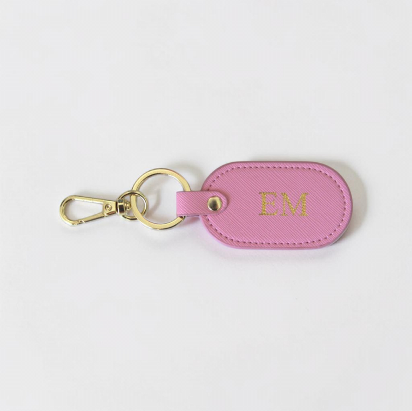 MONOGRAMMED OVAL BABY PINK LEATHER KEYRING